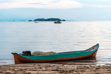 Isolated canoe at the beach