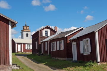 Fototapeta na wymiar Falu red houses in Gammelstaden, Sweden