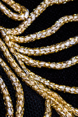 Gold Stitching lines on Black Background