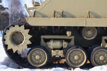 Fototapeta na wymiar Old Tank on the snow, participated in the 2nd world war.