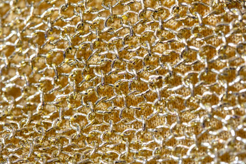 Close Up Of Gold Fabric Chain mail Sewing
