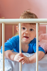 Baby boy in his crib