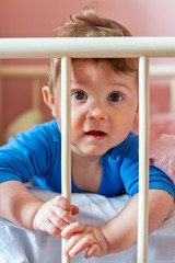 Baby boy in his crib