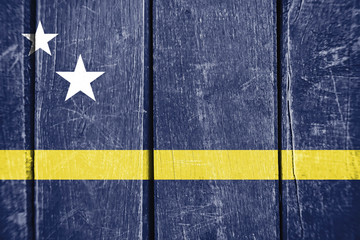 Flag of Curaçao, background of wood.