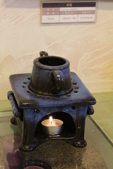 old coffee grinder on wooden table