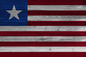 Liberia flag painted on old wood plank