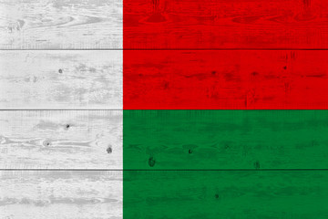 Madagascar flag painted on old wood plank