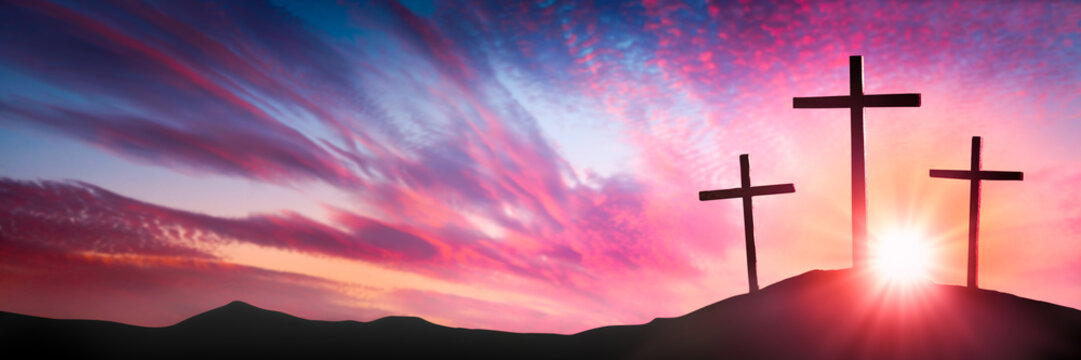 Three Wooden Crosses On Calvary's Hill At Sunrise - Crucifixion And Resurrection Of Jesus Christ Concept