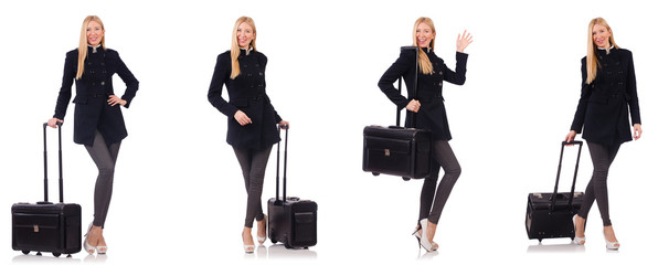 Beautiful woman in black coat with suitcase