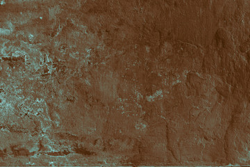 The texture of the old cement wall with scratches, cracks, dust, crevices, roughness, stucco. Can be used as a poster or background for design.