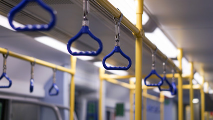 The handle for the passenger stands within the BTS sky train.