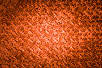 Red metal non slip surface background.