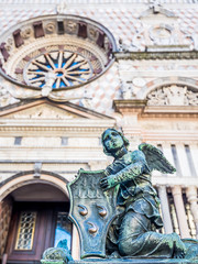 Fototapeta na wymiar Gates of Basilica of Santa Maria Maggiore in Citta Alta, Bergamo, Italy