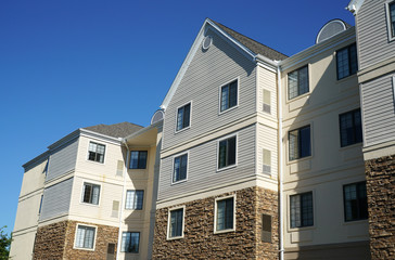 modern rental apartment buildings in sunny day