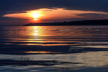 river sunset sun clouds waves