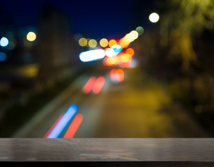 empty table from wenge wood with bokeh background