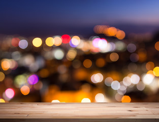 empty table from a light wood with bokeh background