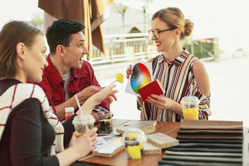 Smart woman in glass choosing perfect color