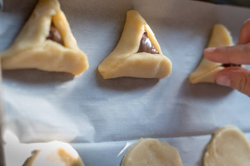 Preparing batch of hamantaschen for Purim Jewish Holiday- Israel