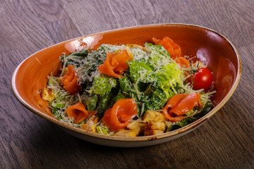 Caesar salad with salmon