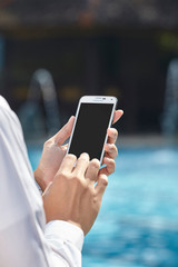 unrecognizable businessman using phone