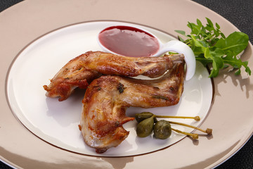 Roasted rabbit legs