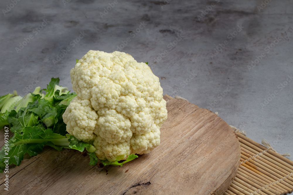 Wall mural Fresh Cauliflower Prepare for cooking over grey table - Wall murals