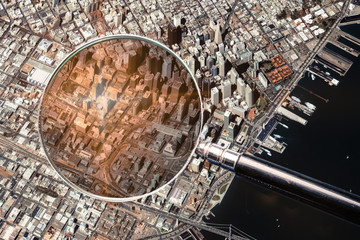 San Francisco city aerial view and magnifying glass.The concept of finding the right address in the city. Elements of this image furnished by NASA.