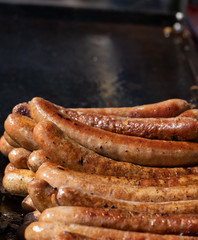 Closeup image of cooked sausages at an Australian election barbecue fund raiser