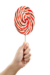 Hand holding large lollipop