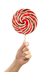 Hand holding large lollipop