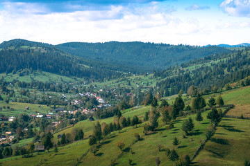 Fototapeta premium Beautiful view of traditional mountain small city on scenic Romania, autumn day