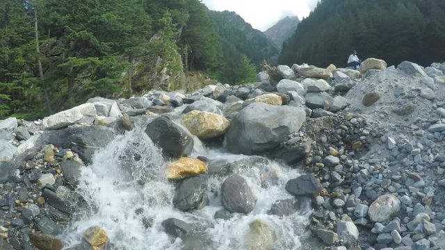 natural Waterfall in Himalayan range, Beautiful Scenic view of waterfall and nature in the great Himalayas.