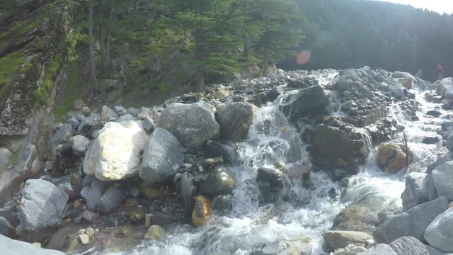 natural Waterfall in Himalayan range, Beautiful Scenic view of waterfall and nature in the great Himalayas.