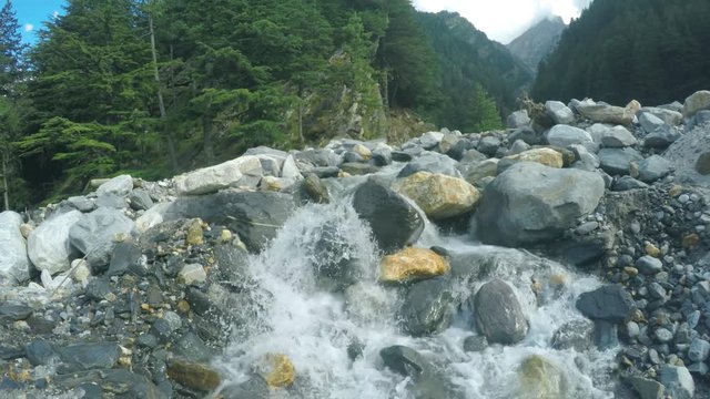 natural Waterfall in Himalayan range, Beautiful Scenic view of waterfall and nature in the great Himalayas.