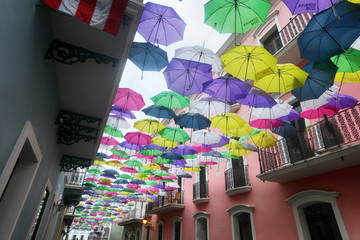 Colorful umbrellas hanging over street in Old San Juan, Puerto Rico
