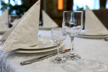 Table with cutlery and glasses
