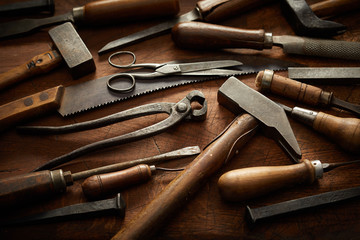 Wood handled vintage hand tools in full frame view