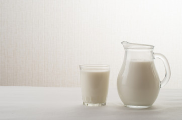Obraz na płótnie Canvas Milk jar on a table