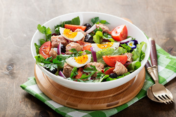 Tuna Fish Salad with Lettuce, Cherry Tomatoes, egg and olives.