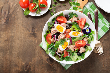 Tuna Fish Salad with Lettuce, Cherry Tomatoes, egg and olives.
