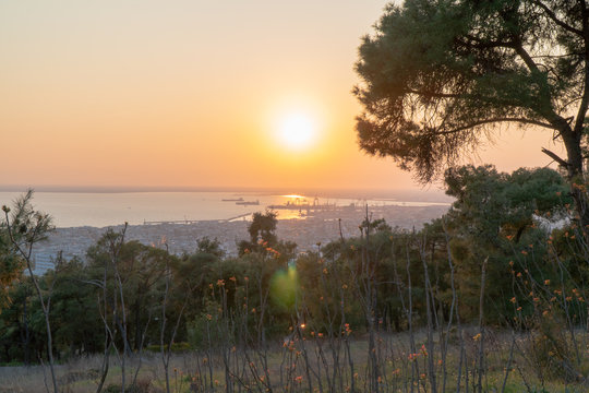 Thessaloniki / Greece 22 march 2019 : sunset in the most beautiful city of Greece photo taken from the hilltop forest Kedrinos Lofos, also known as Seich Sou,the temperture is fine for a walk
