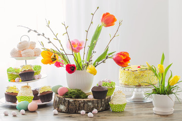 Easter table with tulips and decorations