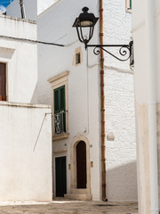Walking in Locorotondo. Narrow streets and white houses. Dreamlike Puglia, Italy