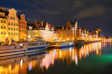Night view of Gdansk harbor and Motlawa river, located in the Old Town of Gdansk city, Poland
