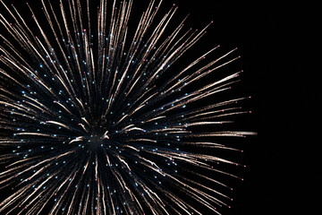 Close-up photo of fireworks exploding in the night sky