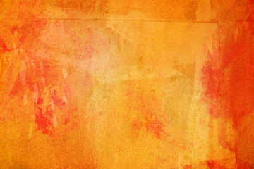 The abstract bright orange surface has a brush painted on the background for graphic design.   