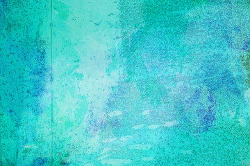 The abstract bright blue surface has a brush painted on the background for graphic design.   