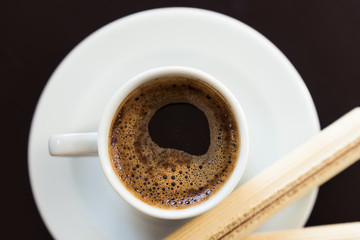 Turkish Coffe in white Cup with Black Background