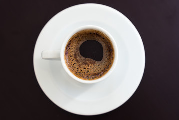 Turkish Coffe in white Cup with Black Background